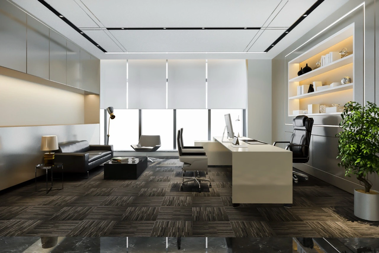 Modern Melbourne commercial office interior featuring motorised roller blinds on large windows, professional workspace with executive desk, leather seating, and ambient lighting - IMEKO Blinds commercial window furnishing solutions