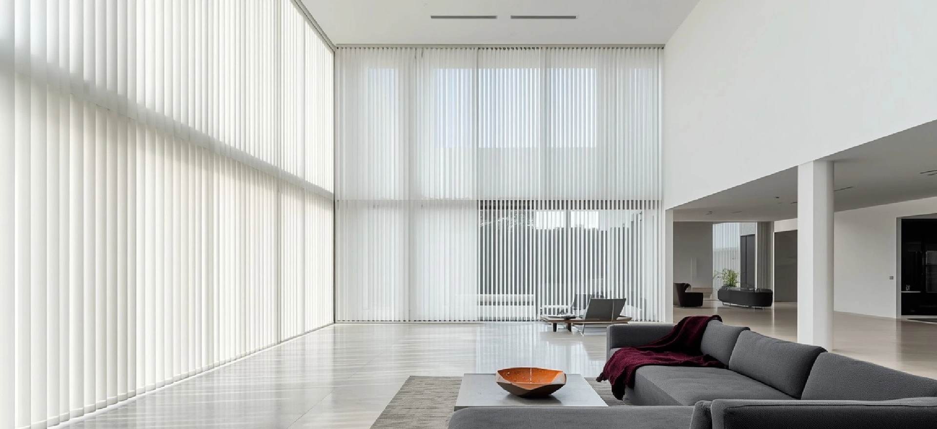 White vertical blinds Melbourne with 41mm heavy-duty track and cordless wand control in a bright open-plan living area