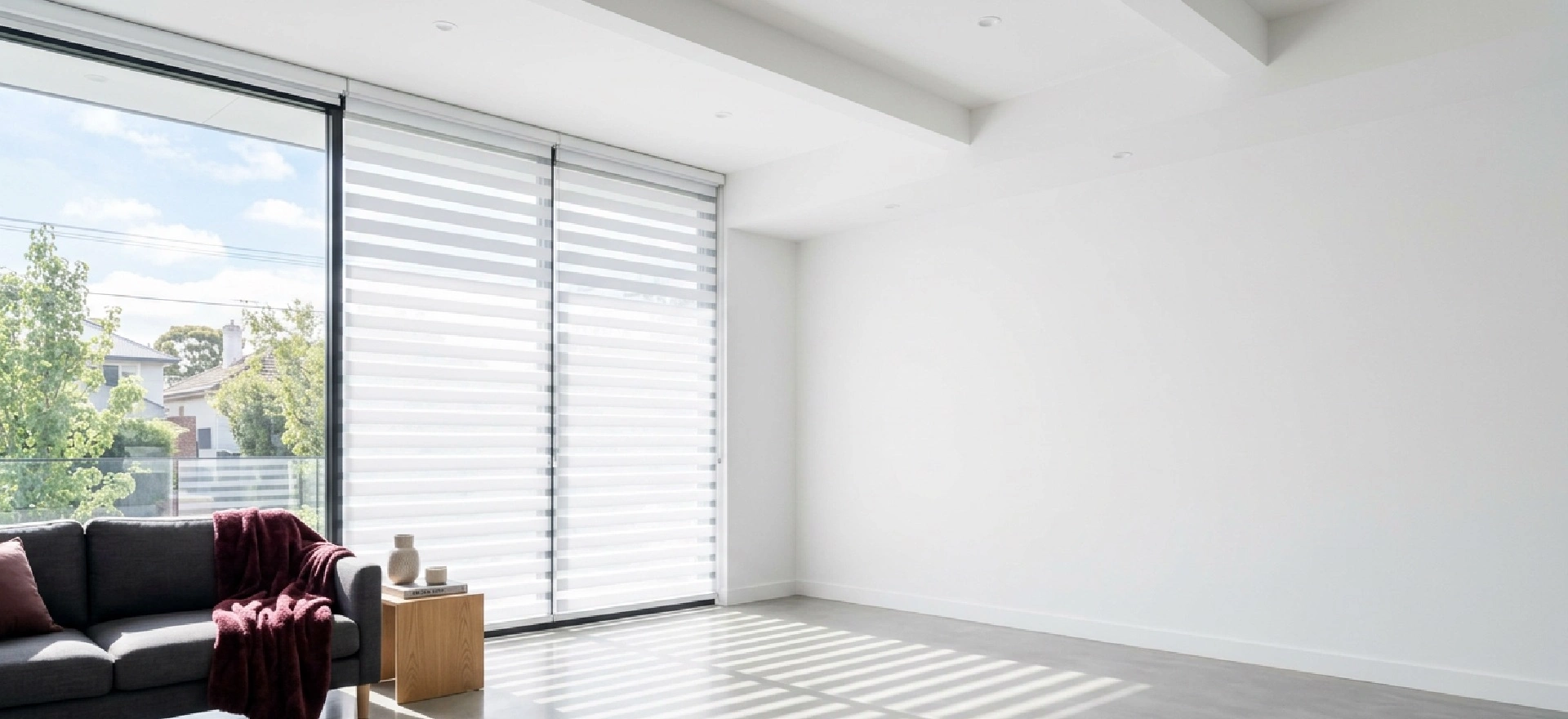 White zebra blinds Melbourne bracket and chain mechanism detail showing secure wall mounting and smooth cord operation