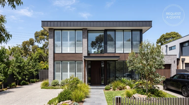 A beautiful modern Melbourne home exterior featuring large front windows fitted with crisp white plantation shutters visible from the outside.