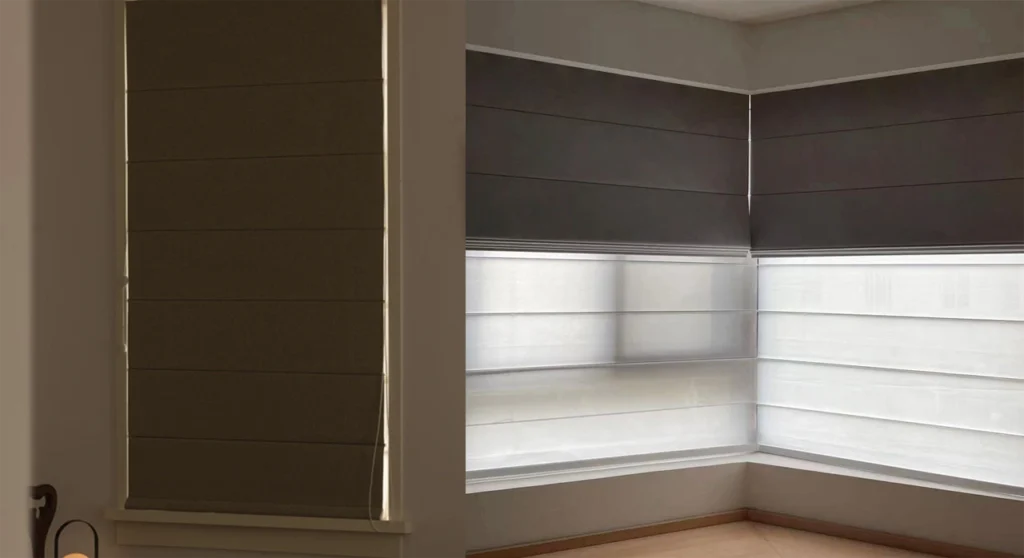 Roman Blinds in Melbourne: The Complete Guide 3 Natural woven linen Roman blinds in an organic warm living room setting filtering soft daylight.